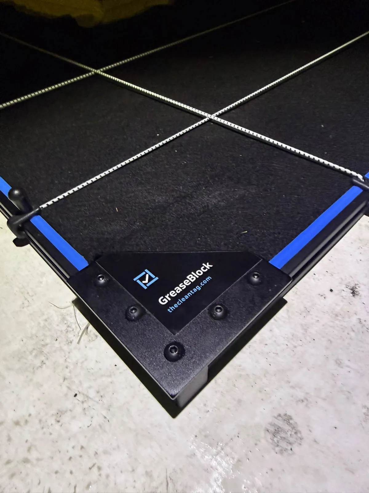 Close-up of a GreaseBlock frame and replaceable absorbent filter